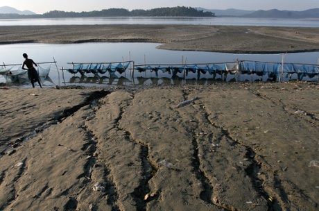 A fisherman on the banks of the river Brahmaputra in Assam. Fishing is one occupation expected to suffer from the construction of dams.