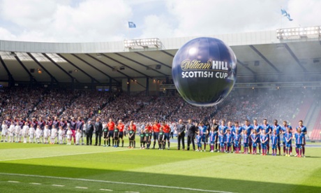 The teams line up before the kick-off.