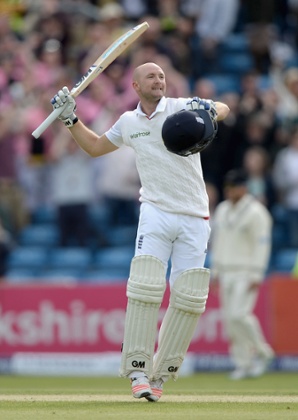 Adam Lyth celebrates reaching his century.
