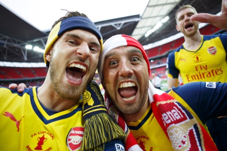 A selfie taken by Aaron Ramsey (left) of him and Santi Cazorla with Per Mertesacker in the background.