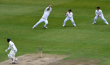 Ross Taylor watches as Gary Ballance misses a catch.
