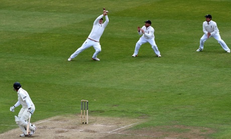 New Zealand's Ross Taylor watches as England's Gary Ballance misses a catch.