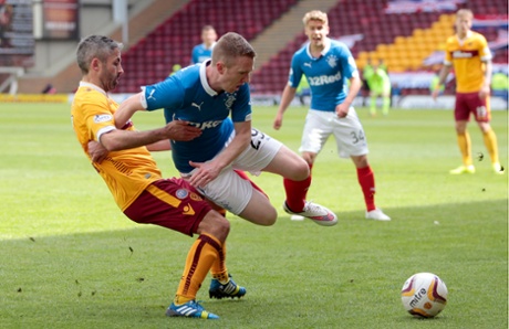 Keith Lasley clashes with Shane Ferguson.