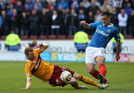Stephen Pearson challenges Lee Wallace.