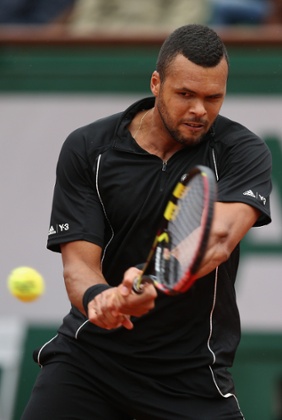 Jo-Wilfried Tsonga plays a backhand.