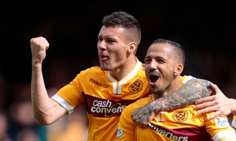 Lionel Ainsworth celebrates scoring their second goal with Marvin Johnson.