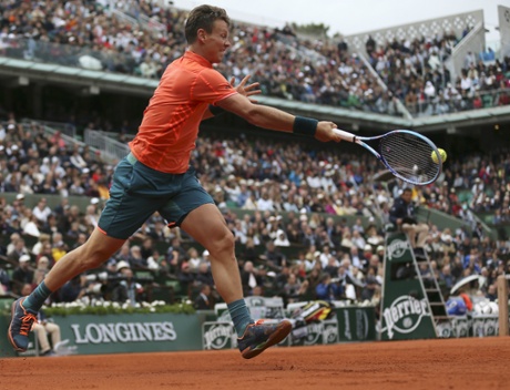Tomas Berdych returns.