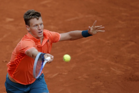 Tomas Berdych returns.