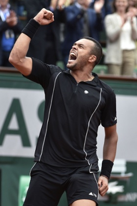 Jo-Wilfried Tsonga celebrates after defeating  Tomas Berdych.