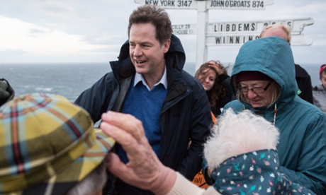 Nick Clegg meets supporters after hosting a campaign rally with the Lib Dem candidate for St Ives, Andrew George, (r) at Lands End.
