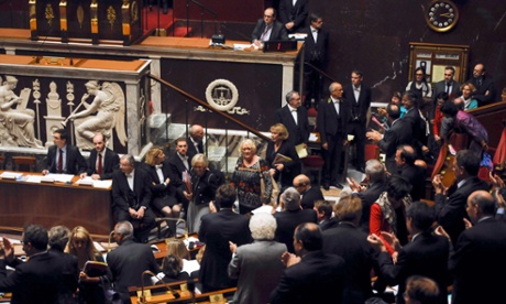 Female members of the Socialist party majority protest against sexism at the National Assembly in Paris, in October 2013.