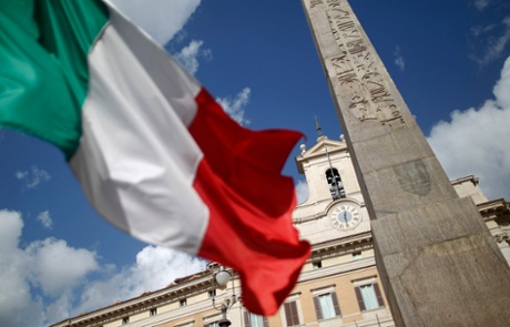 An Italian flag waves in front of the Montecitorio palace before the start of a finances vote in downtown Rome November 8, 2011. Italian Prime Minister Silvio Berlusconi, under massive pressure to resign, faces a crucial vote on public finances in parliament on Tuesday which could sink his government if enough party rebels desert him.Berlusconi has denied reports that his resignation is imminent as he struggles to hold his centre-right coalition together, but the increased political uncertainty in Italy has added to turmoil in Europe, hitting global markets on Monday. REUTERS/Tony Gentile  (ITALY - Tags: POLITICS BUSINESS):rel:d:bm:GF2E7B80Y8B01