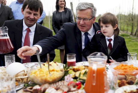 Poland’s president, Bronisław Komorowski, enjoys a meal