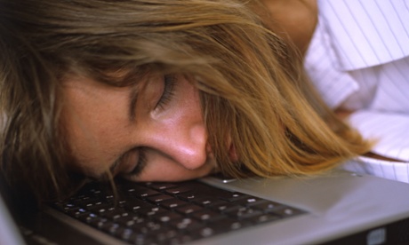 Woman asleep at desk