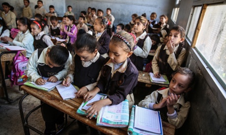 Egyptian students at a primary school in Giza, Egypt. The school's headteacher complains that class sizes can reach up to 70 pupils.