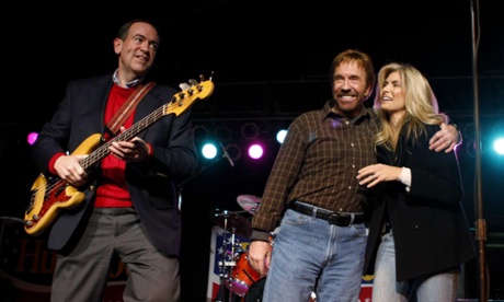 Mike Huckabee with Chuck Norris and wife Gena O'Kelley at a rally in Des Moines, Iowa, 1 Jan 2008.
