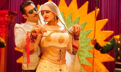 No Merchandising. Editorial Use Only. No Book Cover Usage Mandatory Credit: Photo by Everett/REX Shutterstock (2238032a) DABANGG 2 from left: Salman Khan and Sonakshi Sinha Dabangg 2  - 2012 DABANGG22012FROMLEFTSALMANKHANKAREENAKAPOORSTILLFilm StillsActorFemaleMaleWith OthersPersonality15654722.