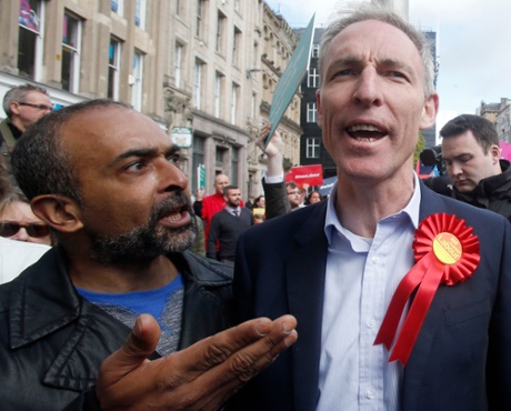 Scottish Labour leader Jim Murphy is confronted by a protester