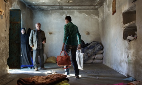 Ghaffar leaves home for the hospital where the operation will take place.