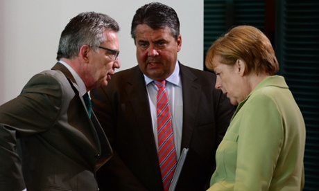 Left to right, German interior minister Thomas de Maiziere, vice chancellor Sigmar Gabriel and chancellor Angela Merkel.