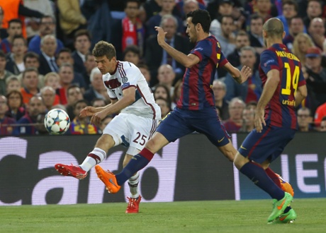 Thomas Mueller attempts a shot at goal.