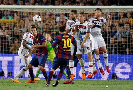Messi shoots from a free kick.