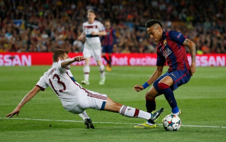 Neymar collects the ball on the edge of the area ahead of Rafinha.