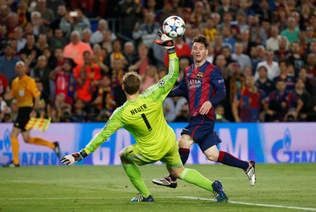 Messi chips the ball over Neuer to scores their second.