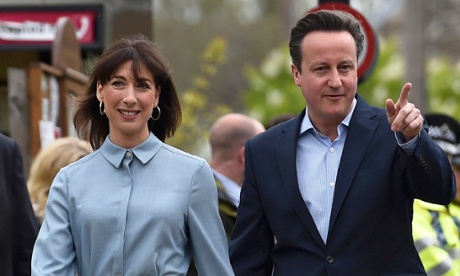 David and Cameron and his wife arrive to vote on 7 May 2015.