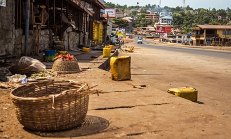 A usually busy street is deserted as Sierra Leone enters the second day of a three day country wide lockdown on movement of people due to the Ebola virus in the city of Freetown