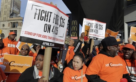 Protesters call for a $15 wage at a rally outside a McDonald’s in the Brooklyn borough of New York.