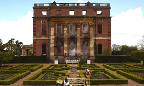 Fire crews at the National Trust's Clandon Park, on 30 April, the day after the fire.