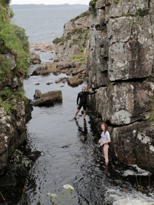 Maddy and Kevin explore a the opening of a gorge at Applecross.