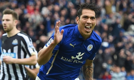 Leonardo Ulloa celebrates scoring the third goal for Leicester from the penalty spot, his second of the game.