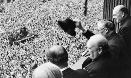 Winston Churchill addresses a crowd from the balcony of the Ministry of Health building in Whitehall, London.