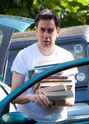 Ed Miliband with some light reading.