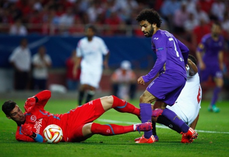 Mohamed Salah of Fiorentina is thwarted by goalkeeper Sergio Rico.