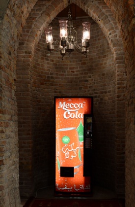 A Mecca Cola drinks machine in the Santa Maria della Misericordia.