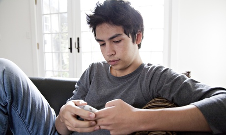 Boy looking at phone