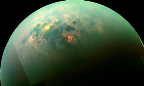Near-infrared, colour mosaic from Nasa’s Cassini spacecraft showing the sun glinting off Titan’s north polar seas.