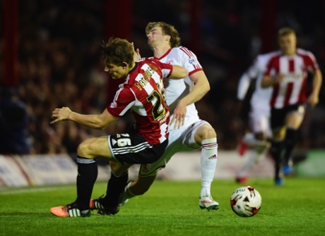 James Tarkowski collides with Patrick Bamford.