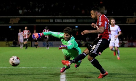 Andre Gray scores his side's first goal after a mistake by Middlesbrough goalkeeper Dimitrios Konstantopoulos.