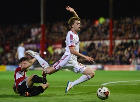 Patrick Bamford is challenged by Harlee Dean.