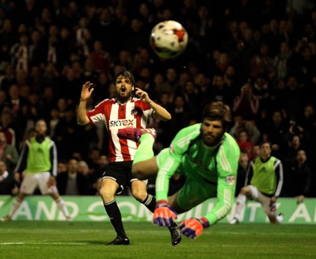 Jonathan Douglas sees his shot saved by Konstantopoulos.