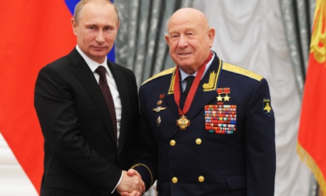 Russian president Vladimir Putin and Russian cosmonaut Alexei Leonov, right, at an awarding ceremony in Moscow's Kremlin.