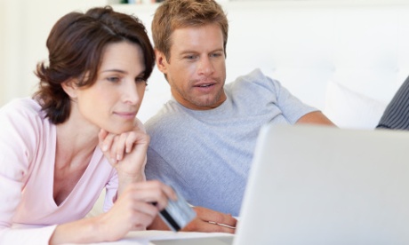 Couple using laptop