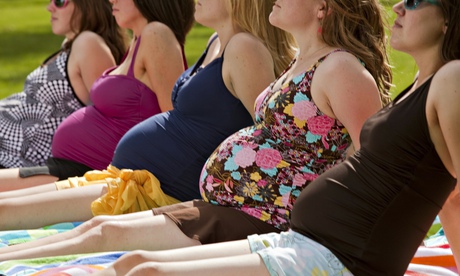 Pregnant women in a row