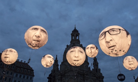 Activists from the One campaign install illuminated balloons with portraits of the G7 heads of state in front of the Frauenkirche cathedral prior the G7 finance ministers’ meeting in Dresden, Germany, on 27 May. 