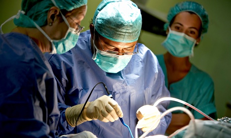 Surgeons operating 