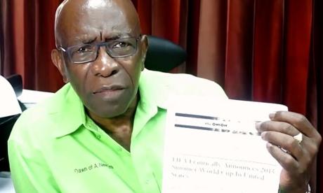 Screen grab of Jack Warner holding Onion piece.